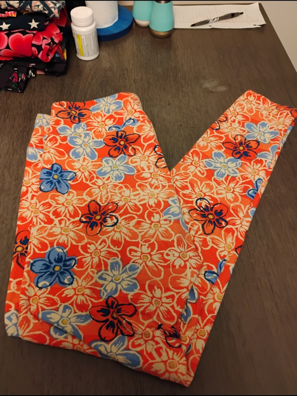 LuLaRoe Bright Orange Floral Leggings with Blue Accents